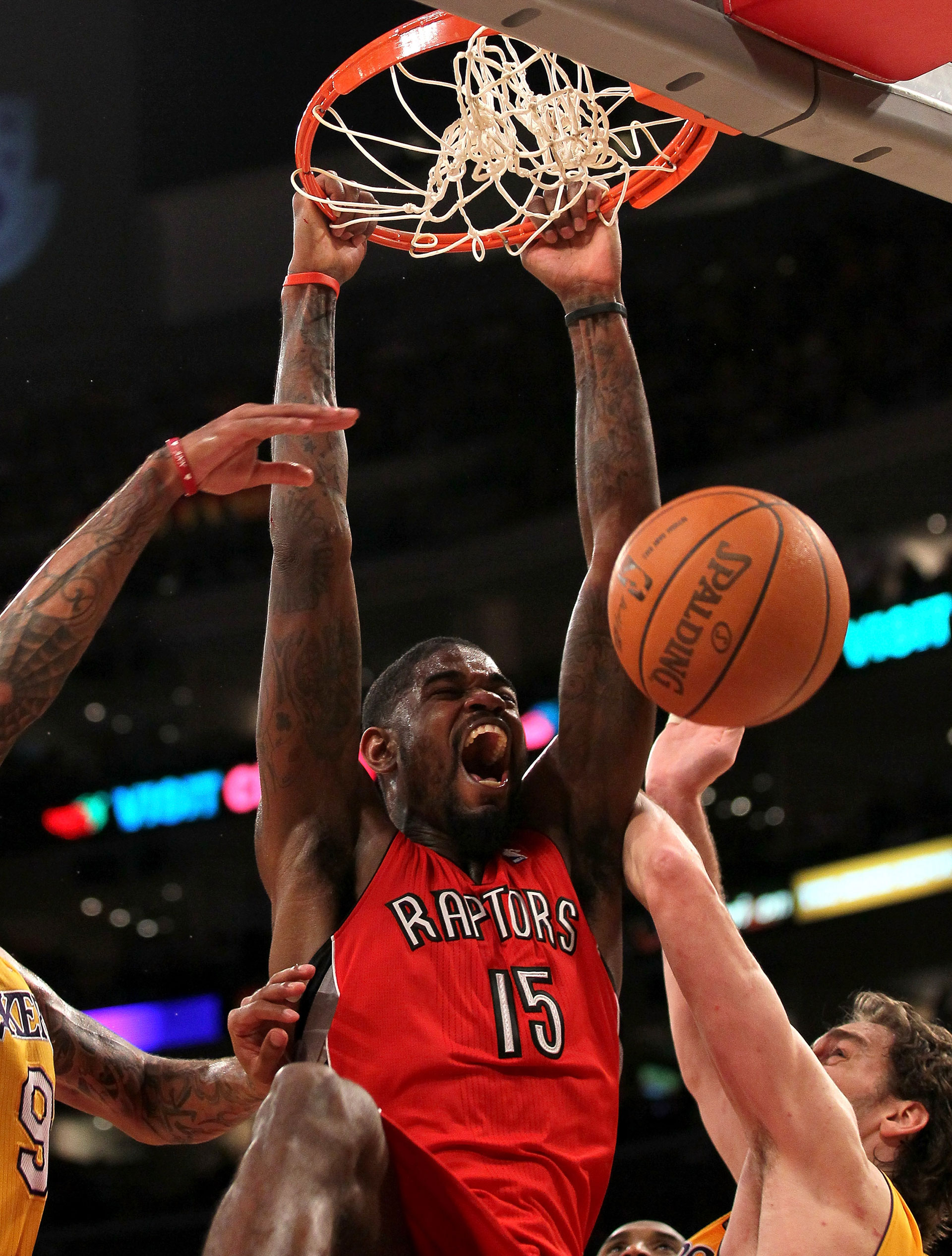 Amir Johnson #15 of the Toronto Raptors dunks against the Los Angeles Lakers at Staples Center