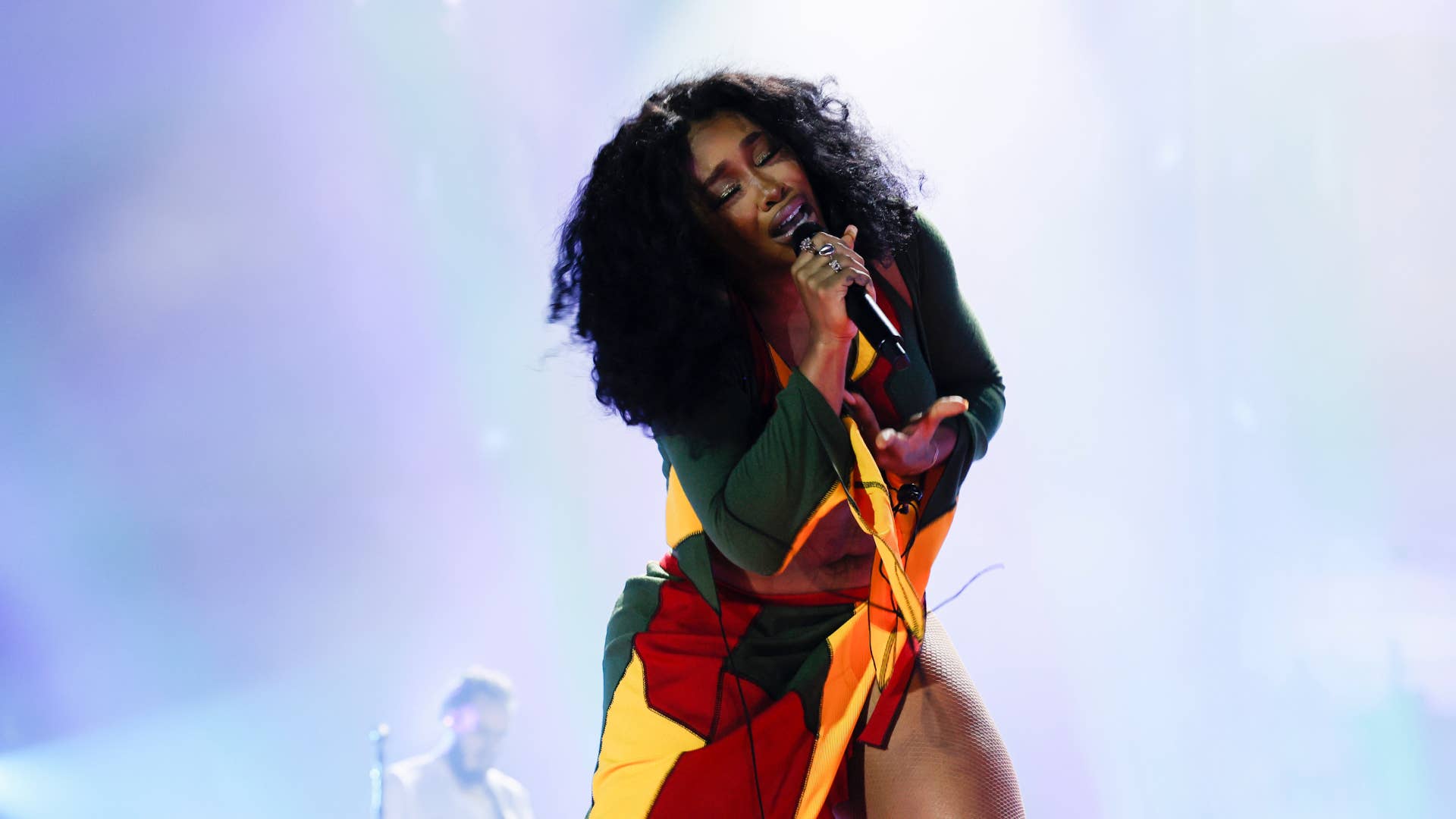 SZA is seen performing live