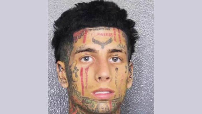 island boys star pictured in mugshot