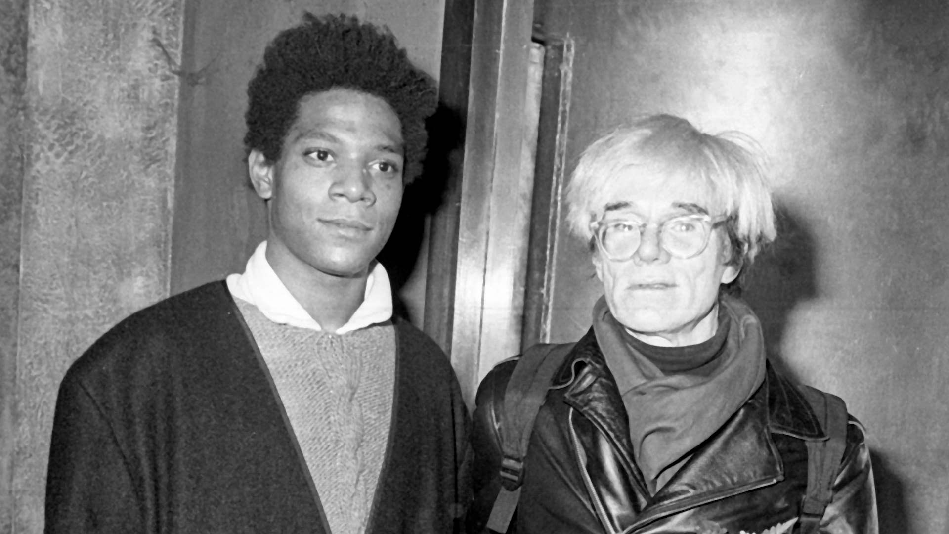 Jean Michel Basquiat and Andy Warhol attend Gifts For The City Of New York Benefit.