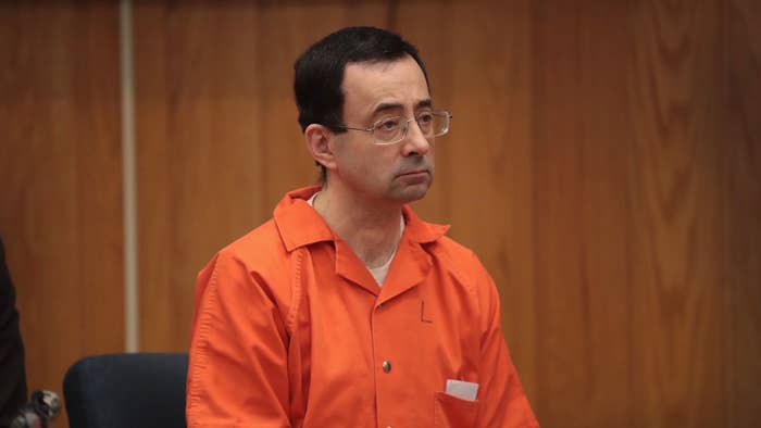 Larry Nassar sits in court listening to statements before being sentenced by Judge Janice Cunningham