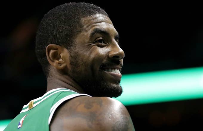 Kyrie Irving smiles.