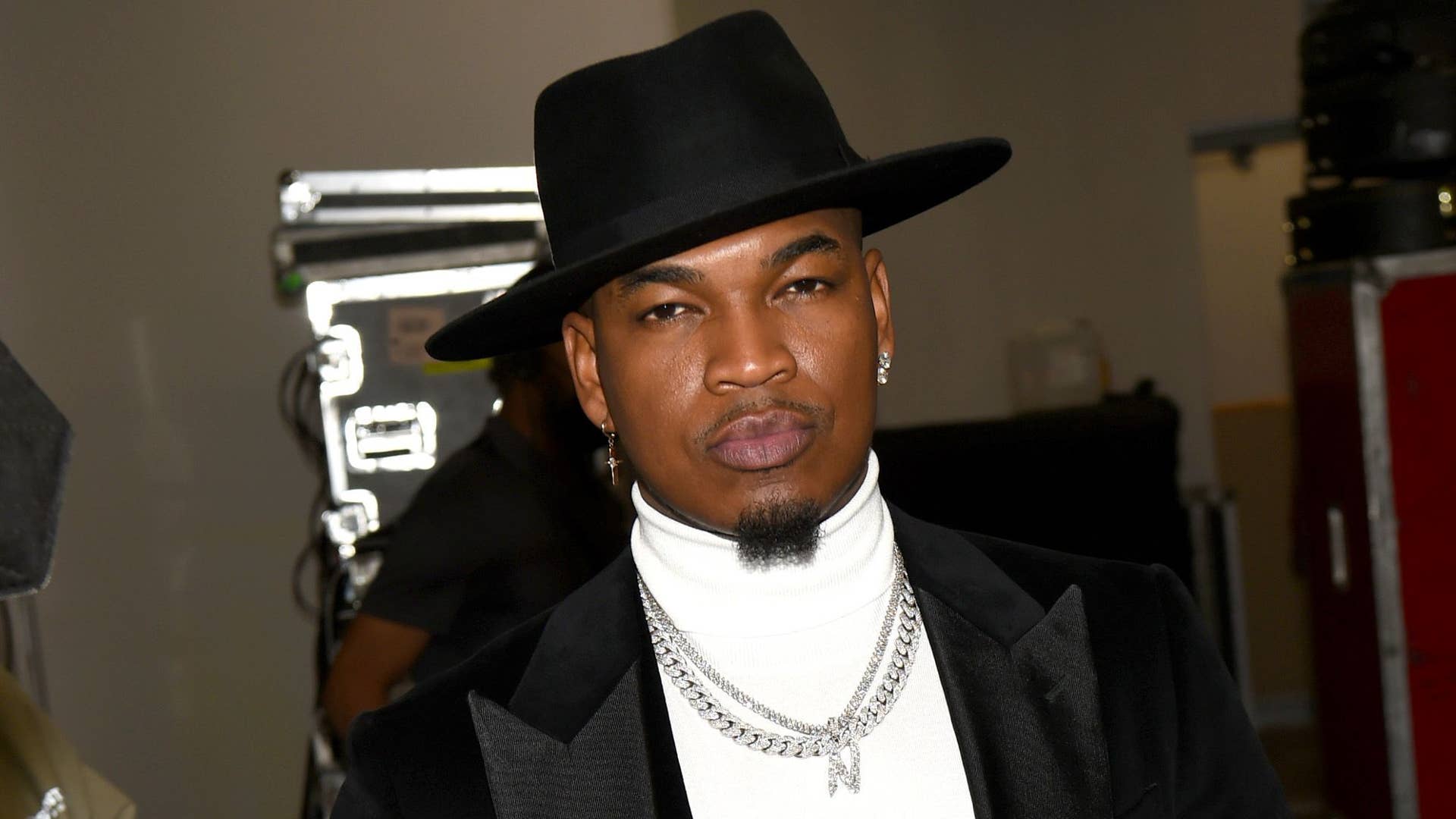 Ne-Yo is pictured staring at the camera