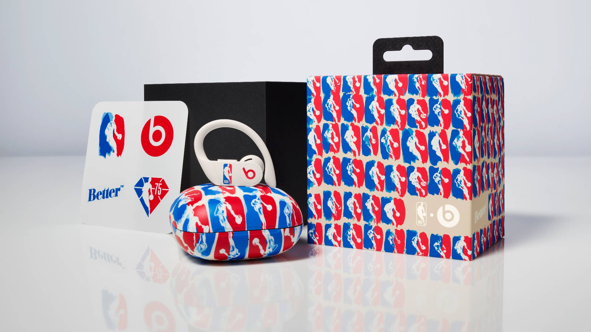 The full packaging for the NBA x Better Powerbeats Pro, featuring an abstract NBA logo in red and blue