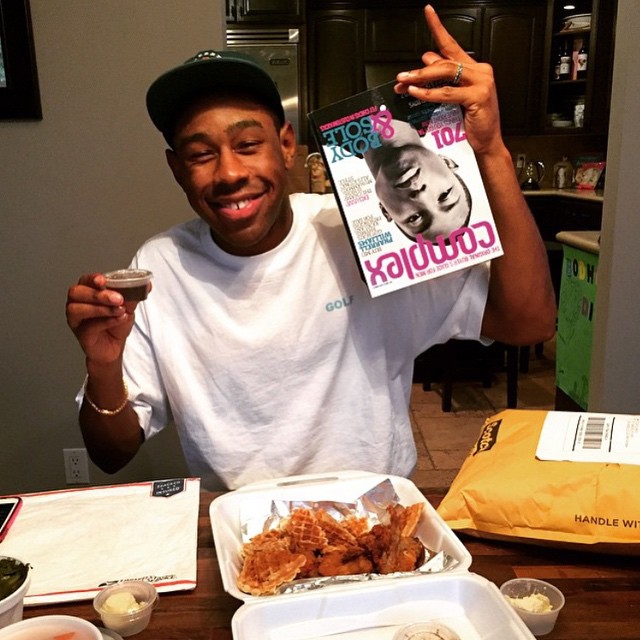 Tyler The Creator Holding An Issue of Complex