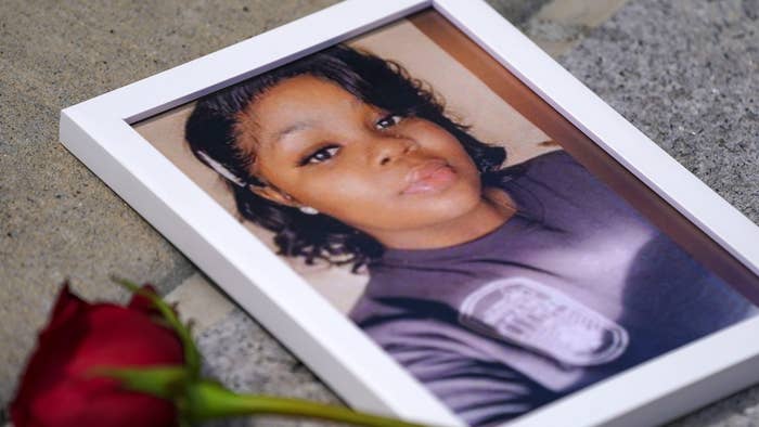 photo of Breonna Taylor is seen among other photos of women who have lost their lives as a result of violence