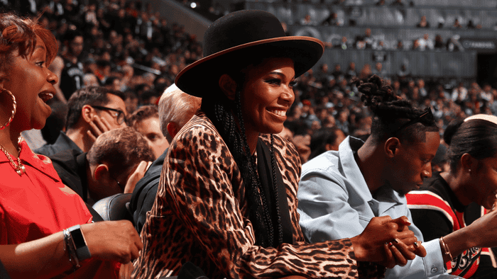 Gabrielle Union sits courtside at a Heat game.