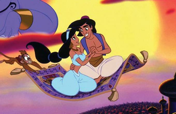 Aladdin and Jasmine riding a magic carpet in the Disney cartoon version of the tale.