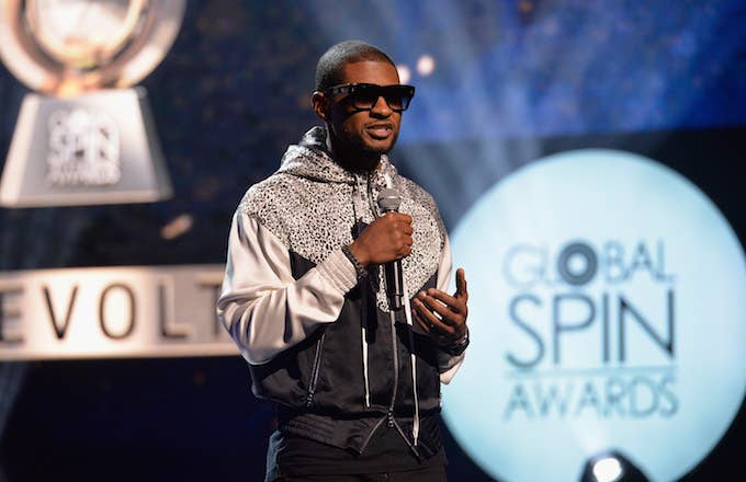 Usher speaks to the audience at the 6th Annual Global Spin Awards.