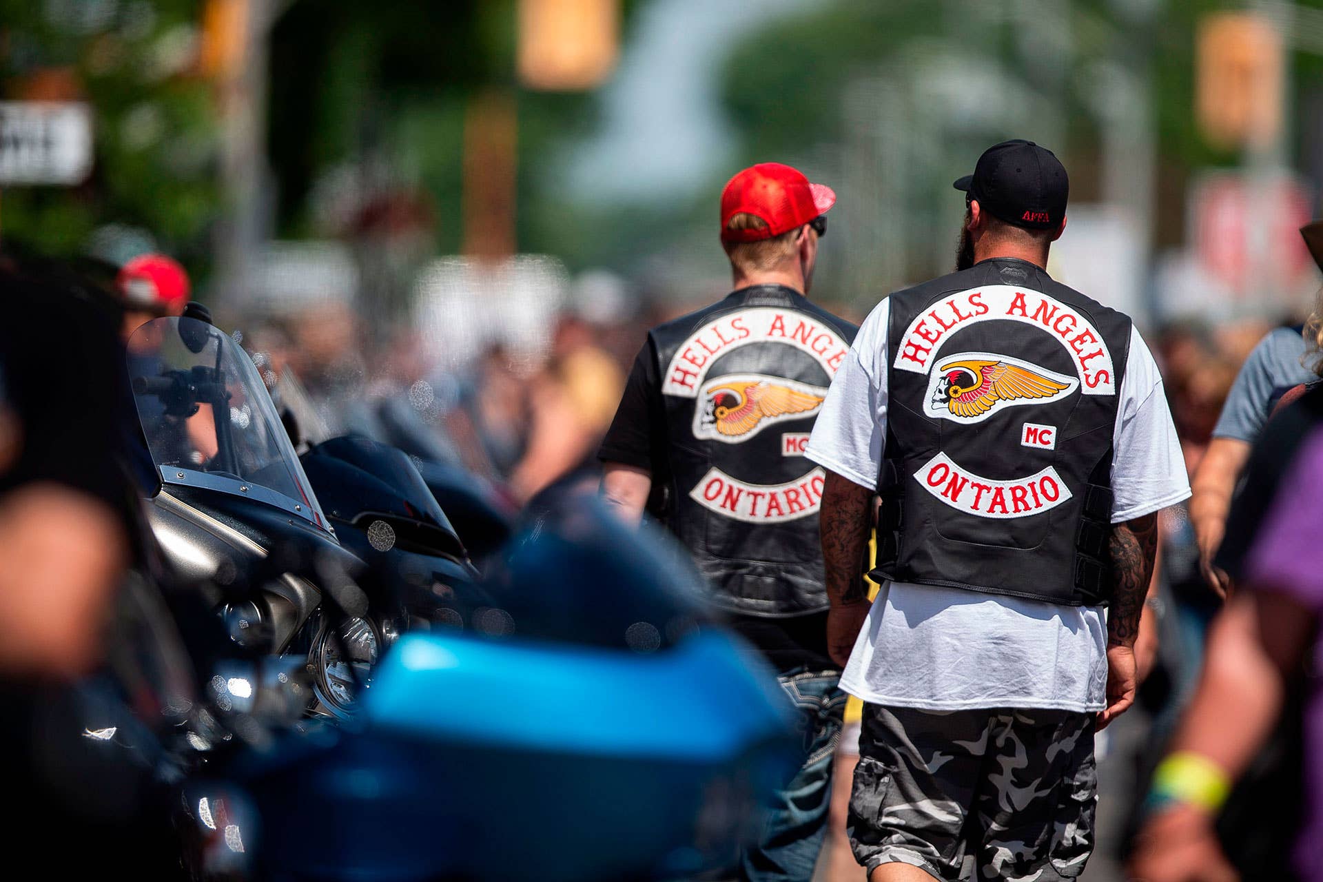 Members of the Hells Angels walk among thousands of bikers and motorcycle enthusiasts on the streets of Port Dover, Ontario, for the Friday the 13th gathering on July 13 2018