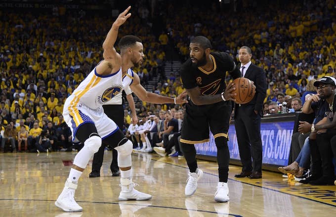 Steph Curry guards Kyrie Irving during NBA Finals.
