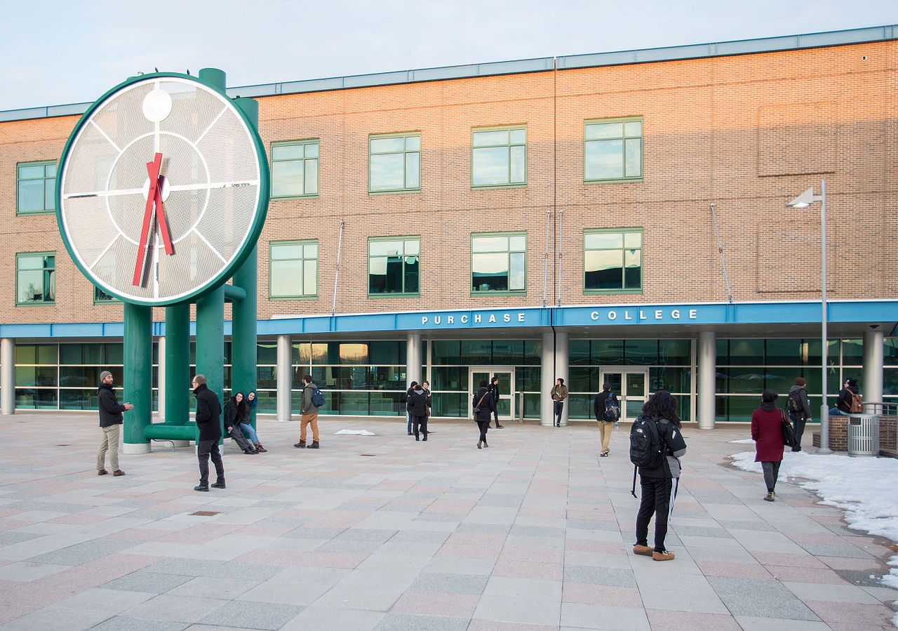 A college campus is seen with students