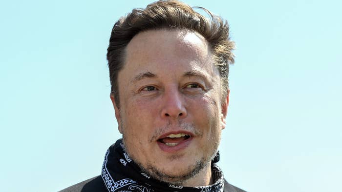 Elon Musk wears a bandana.