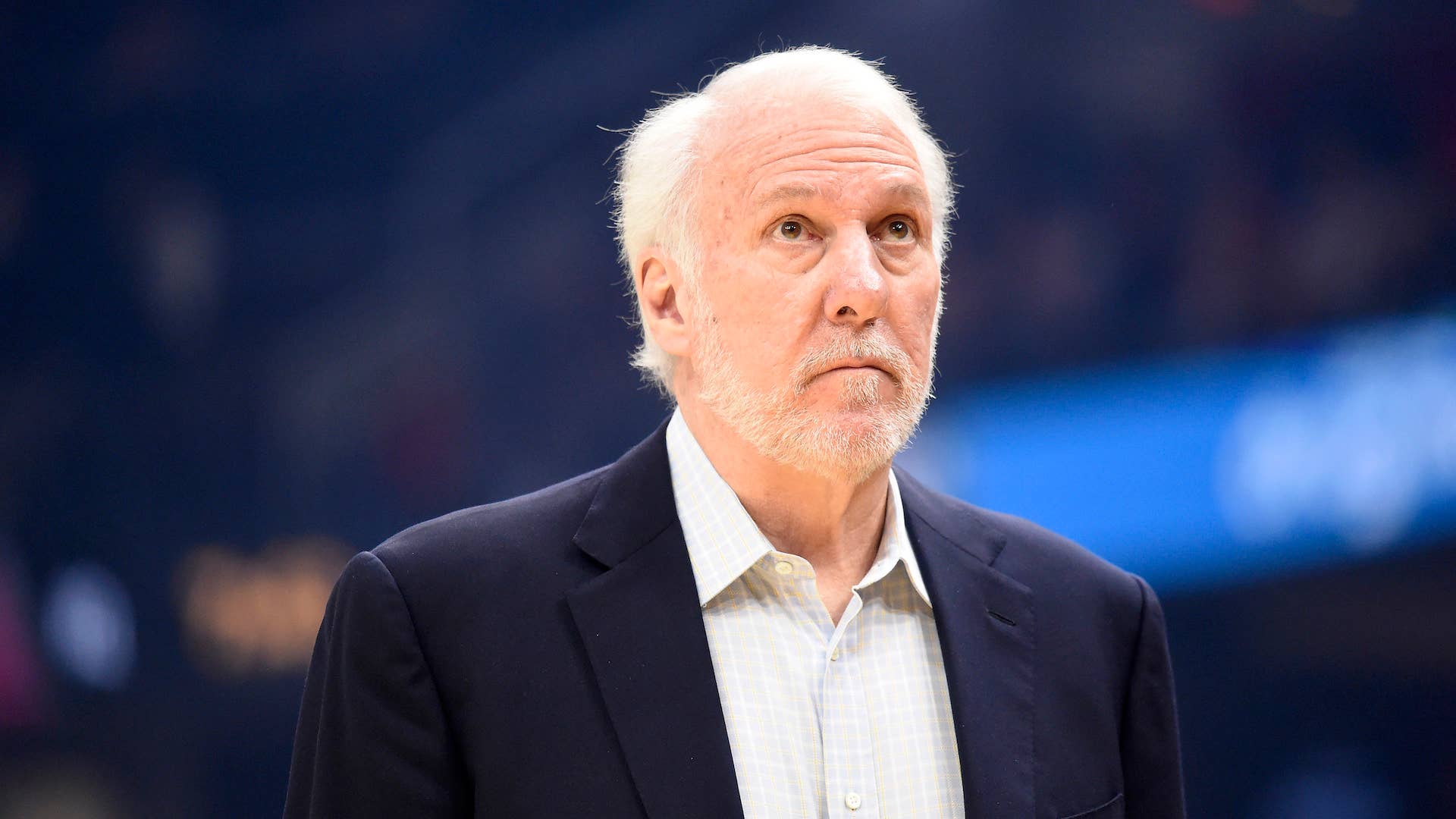 Gregg Popovich watches the scoreboard during first half against the Cavaliers.