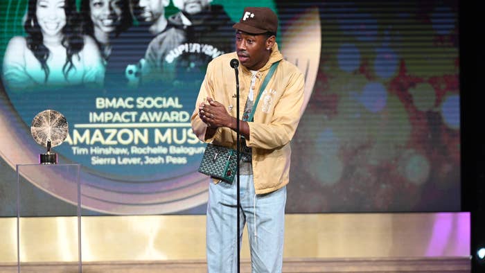 Tyler the Creator is seen giving a speech