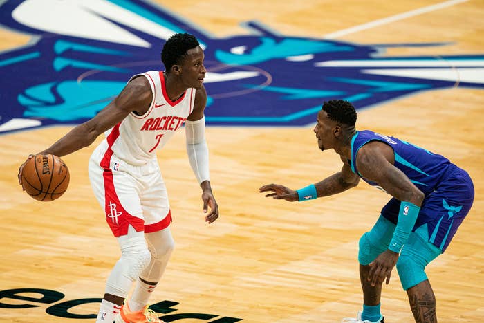 Victor Oladipo #7 of the Houston Rockets looks to pass the ball while guarded by Terry Rozier #3