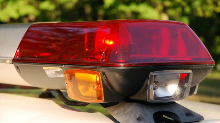 Stock image of a police siren on top of police car