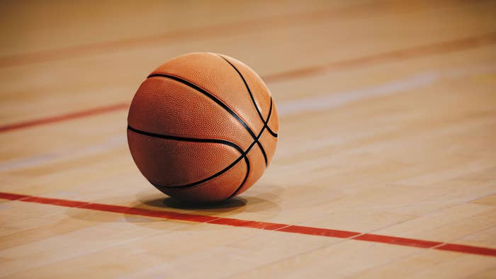 Basketball on a high school court.