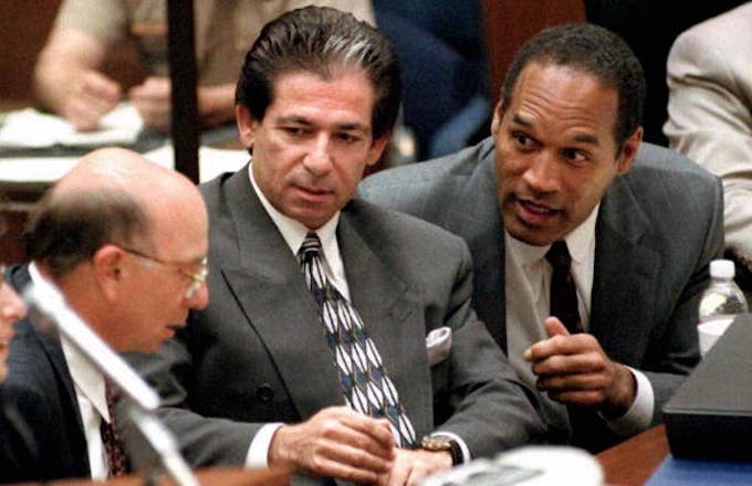 O.J. Simpson (R) consulting with friend Robert Kardashian