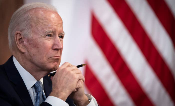 Joe Biden holding a pen