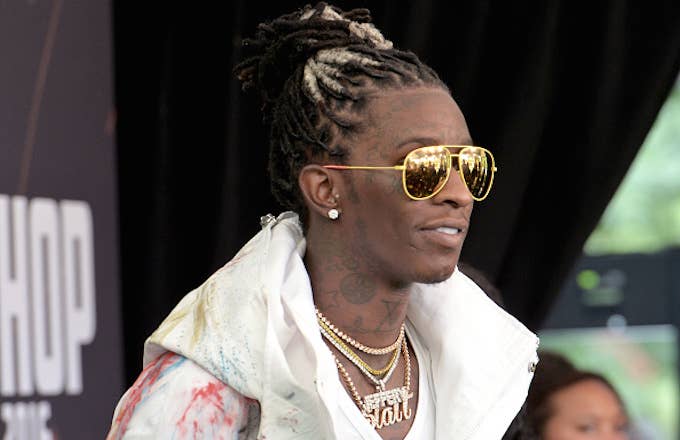 Young Thug attends the BET Hip Hop Awards 2016 Green Carpet