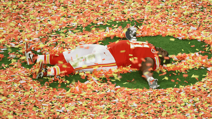 The Chiefs&#x27; Derrick Nnadi makes confetti angels after winning the Super Bowl.