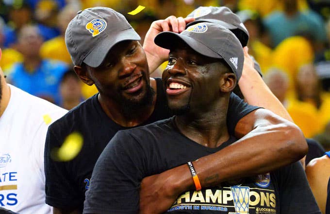 Draymond Green and Kevin Durant celebrate after the Warriors win the 2017 NBA title.