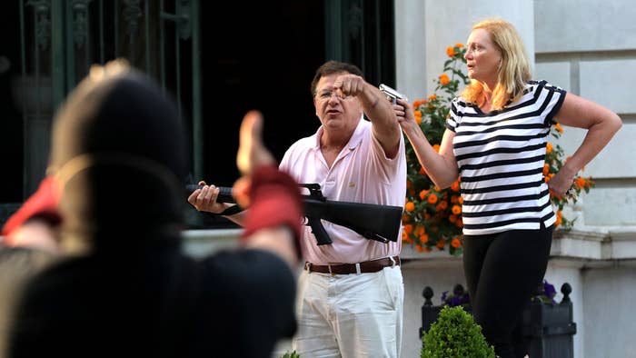 St. Louis couple pointing guns at peaceful protesters.