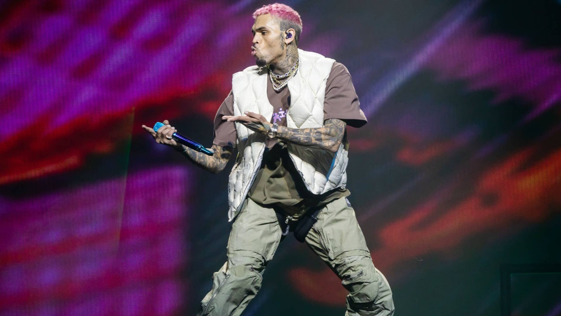 Chris Brown Throws Fan's Phone Dancing