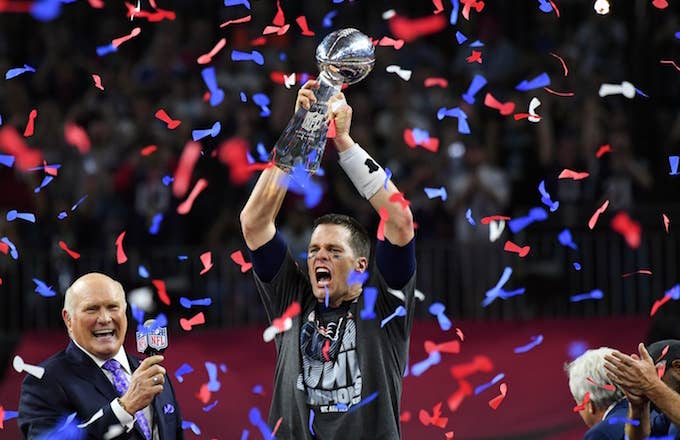 Tom Brady raises Lombardi Trophy following Patriots&#x27; Super Bowl LI victory.