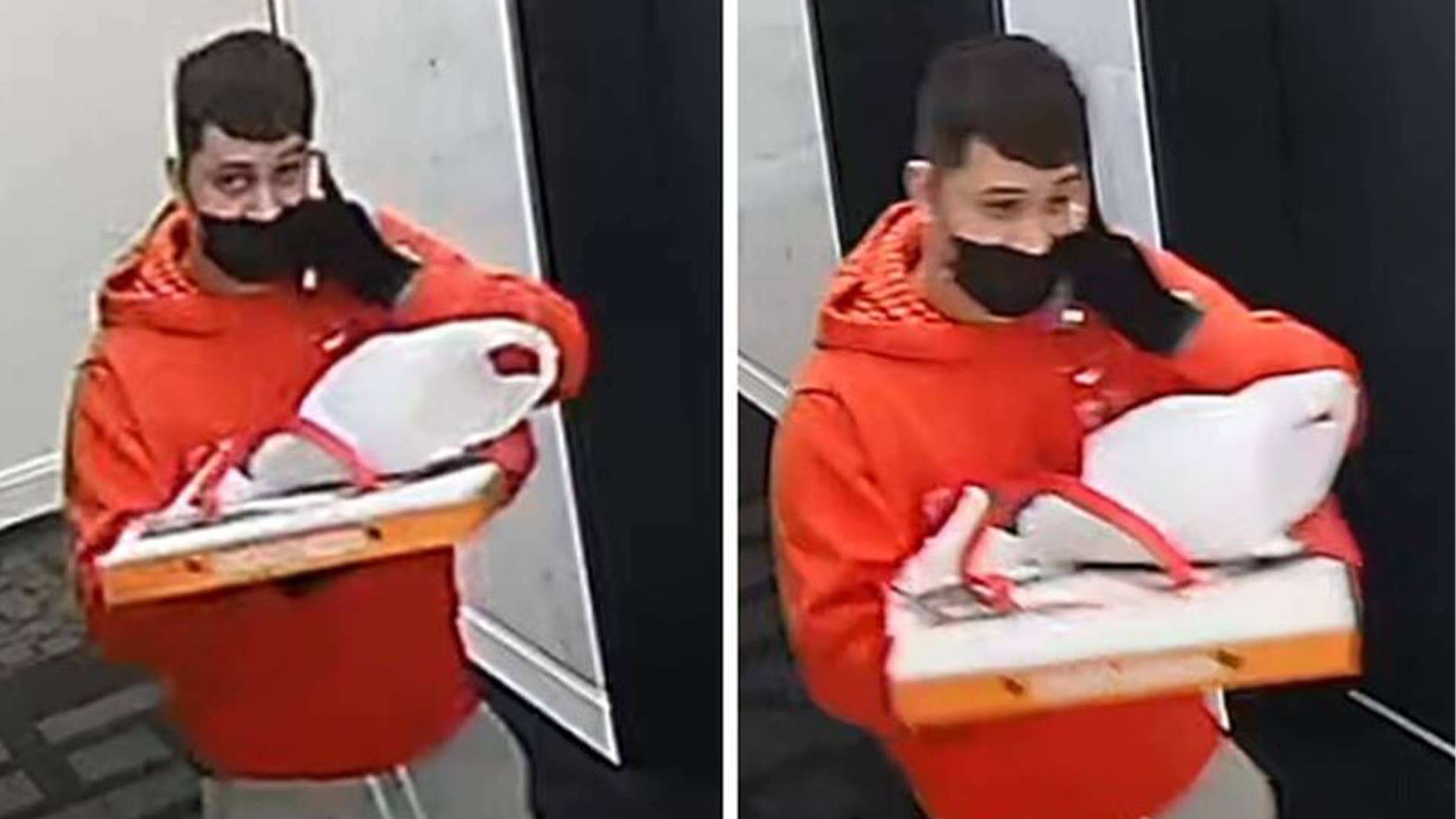 A suspect holding a pizza box