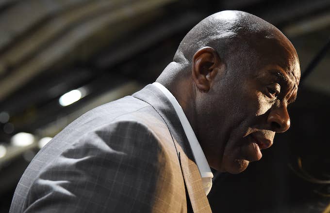 Magic Johnson looks on during the game between the Portland Trail Blazers and Los Angeles Lakers