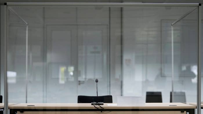 The seat of the defendant is empty at the courtroom prior to a trialagainst a 96-year-old former secretary for the SS commander of the Stutthof concentration camp at the court room.