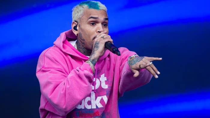 Chris Brown is seen performing at an event