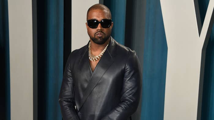 Ye rocks a leather blazer on the red carpet.