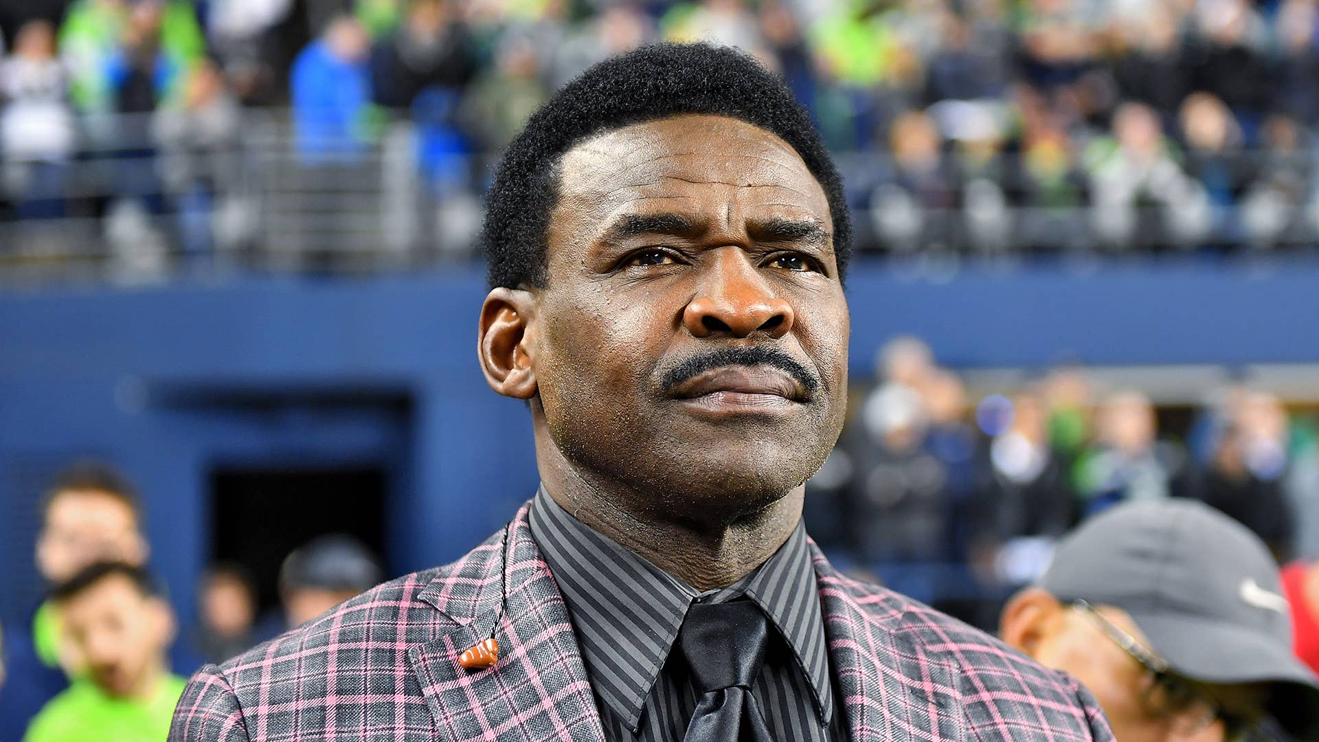 HOF wide receiver Michael Irvin of the Dallas Cowboys watches the game