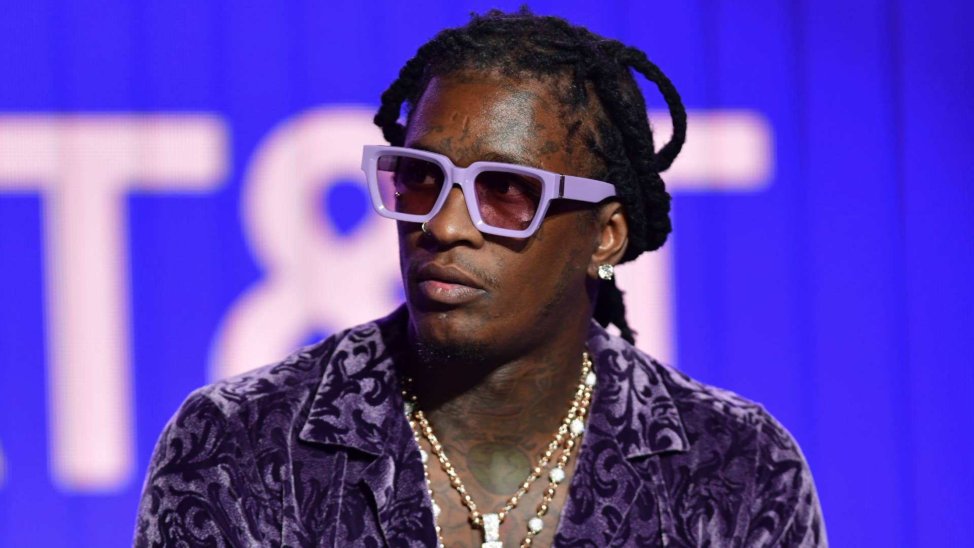Young Thug is seen speaking at a panel event