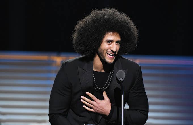 Colin Kaepernick receives the SI Muhammad Ali Legacy Award.