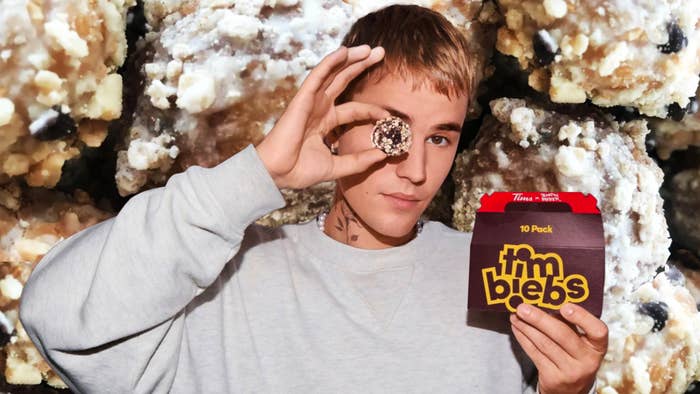 Justin Bieber posing with a box of Timbiebs for his new Tim Hortons campaign.