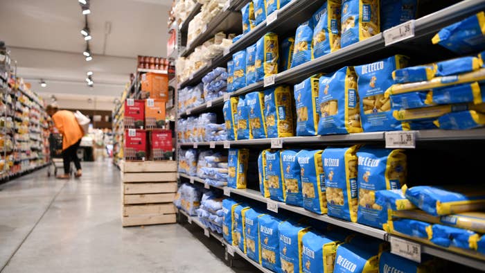 A supermarket in Italy with the pasta section in view.