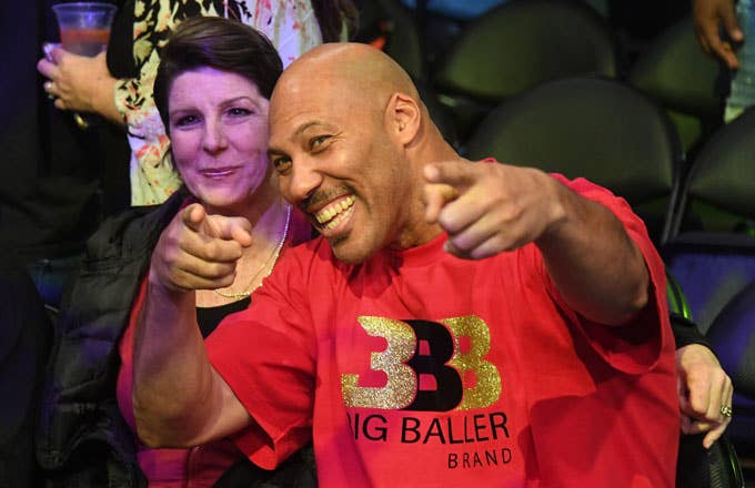LaVar Ball poses for the cameras with his wife, Tina.