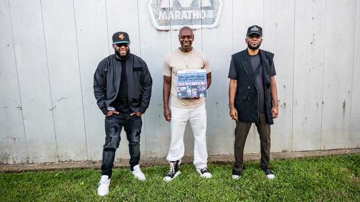 Dave Chappelle is seen holding a vinyl release