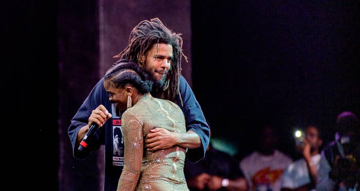 j cole ari lennox hugging