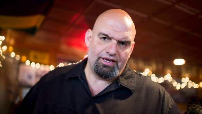 John Fetterman speaks with supporters during his meet and greet campaign stop.