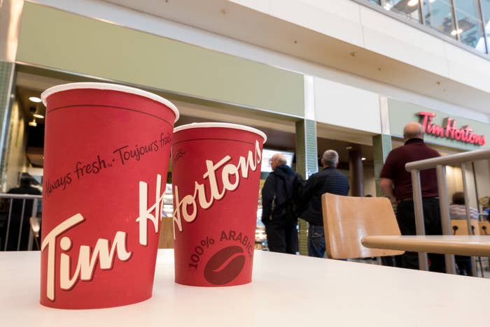 Two Tim Hortons cups on table