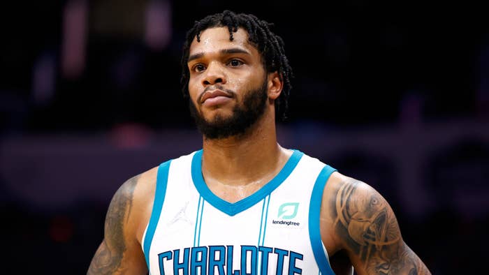 Miles Bridges looks on during overtime in the game against the Philadelphia 76ers.