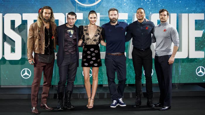 &#x27;Justice League&#x27; cast pose for a photograph at a photocell.