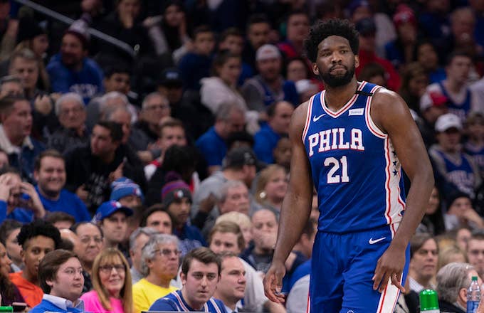 Joel Embiid #21 of the Philadelphia 76ers walks off the court after injuring his finger.