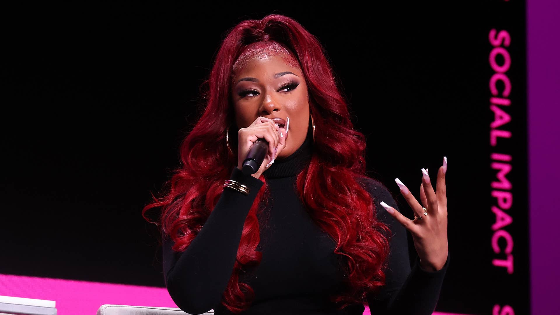 Megan Thee Stallion speaks at the 2022 Forbes 30 Under 30 Summit at Detroit Opera House