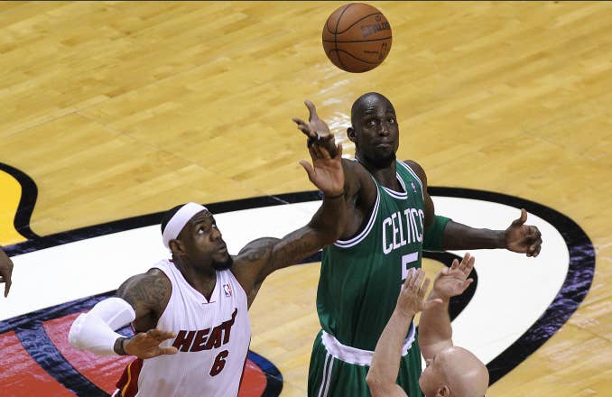 Boston Celtics power forward Kevin Garnett (#5) wins the opening tipoff